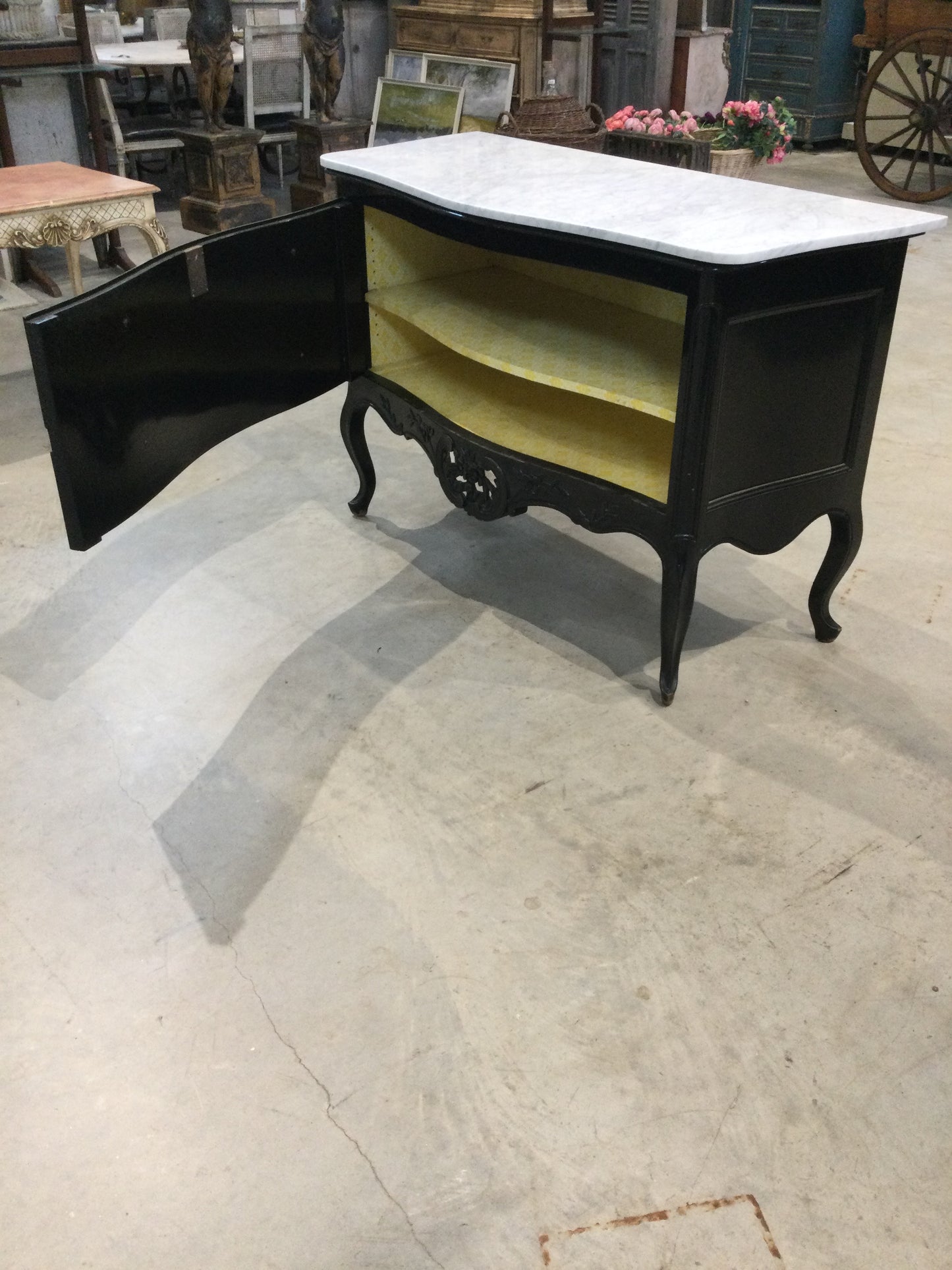 Black Dresser with Brass Handles White Marble Top Front Door Opening