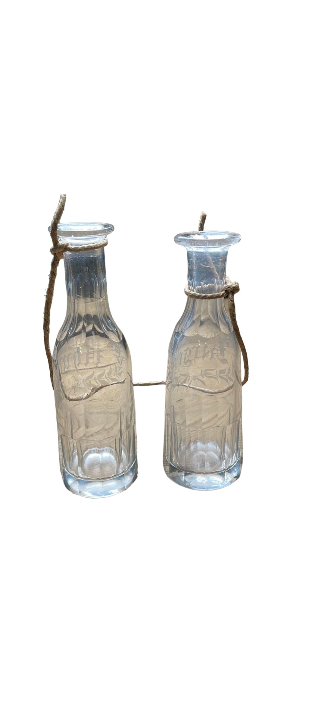 Pair of Rum Bottles Attached by Rope