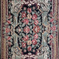 #129 Black and Red Medallion Rug