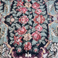 #129 Black and Red Medallion Rug