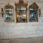 Monumental Louis XVI Style Giltwood Mirror with Foliate Crest