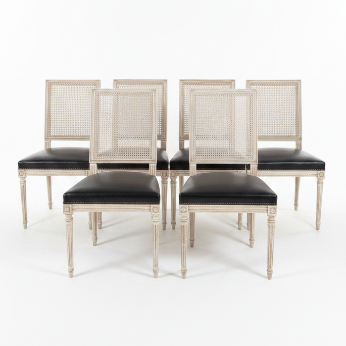 Set of Black Leather and Cane Back Dining Chairs in the Colonial Style