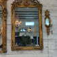Monumental Louis XVI Style Giltwood Mirror with Foliate Crest