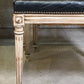 Set of Black Leather and Cane Back Dining Chairs in the Colonial Style
