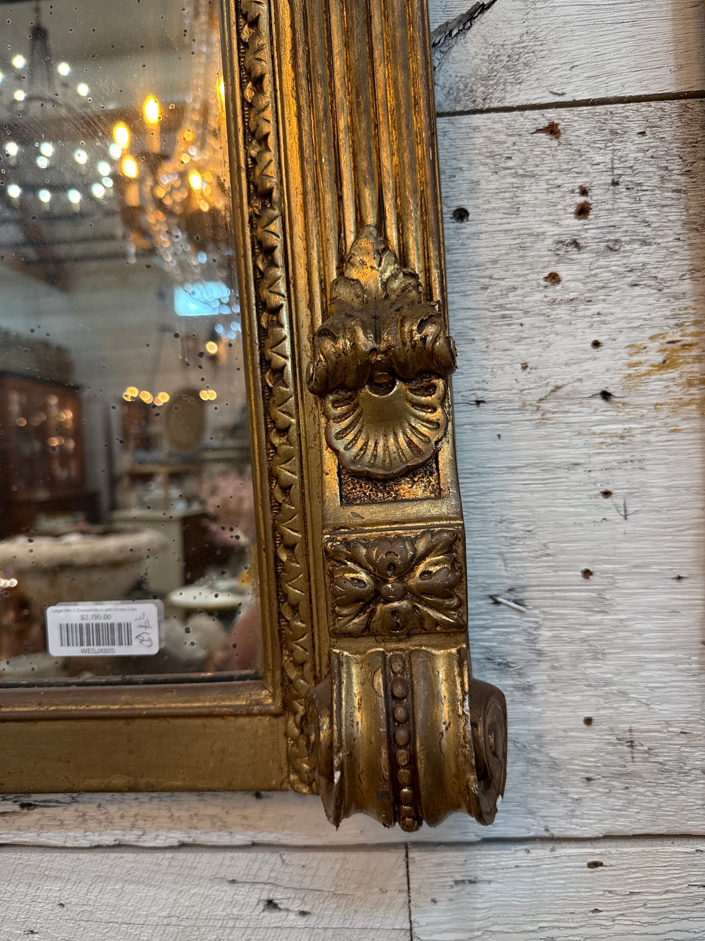 Monumental Louis XVI Style Giltwood Mirror with Foliate Crest
