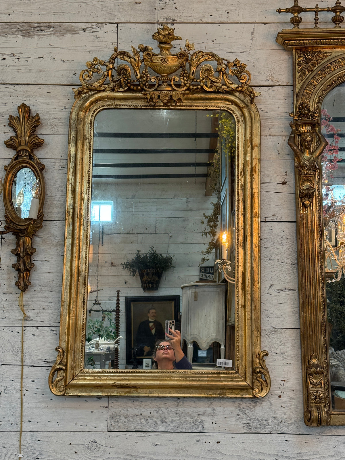 Monumental Louis XVI Style Giltwood Mirror with Foliate Crest