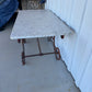 Oversized Marble and Iron Red Pastry Table