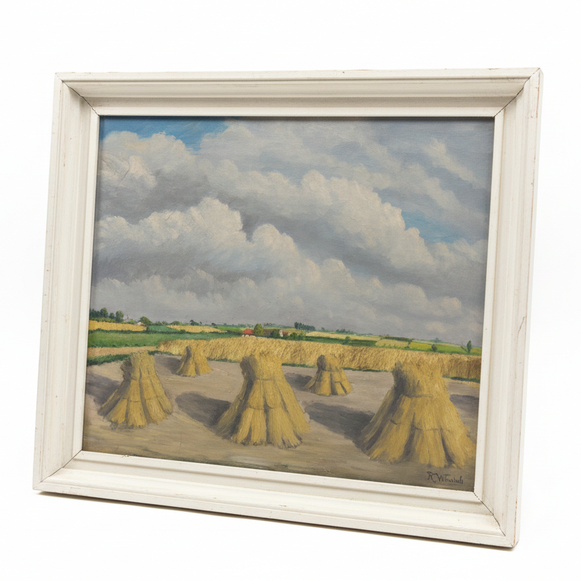 Painting of a landscape with haystacks under a cloudy sky, framed in white.