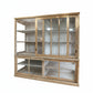 Wooden display cabinet with glass doors on a white background