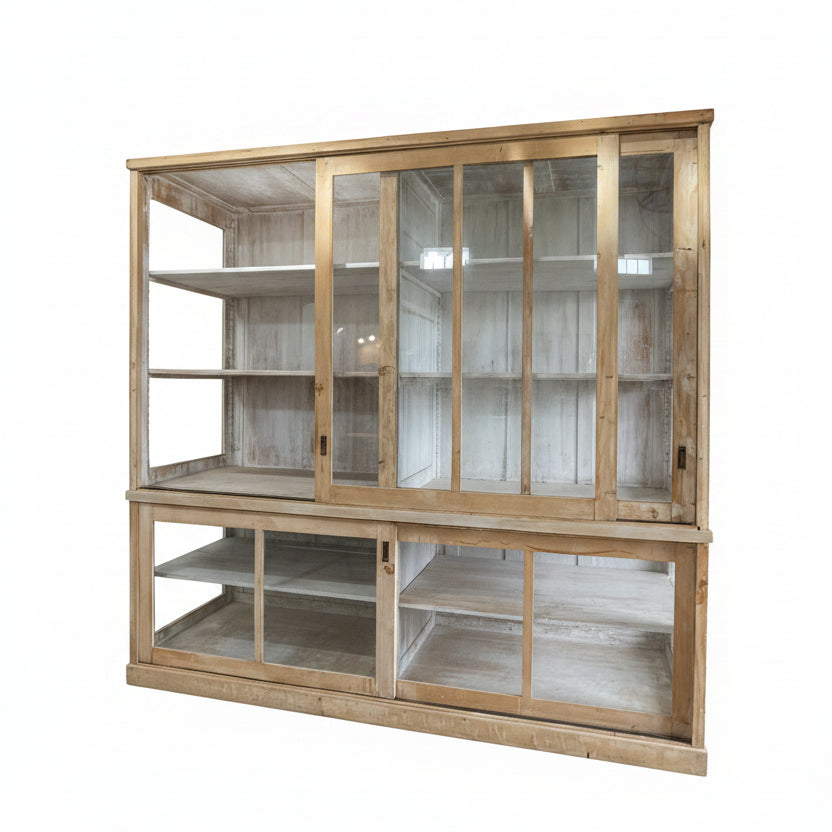 Wooden display cabinet with glass doors on a white background