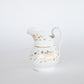 Gold and White Jug