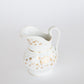 Gold and White Jug