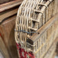 Grape Sorting Basket with Red Writing and Red Handles