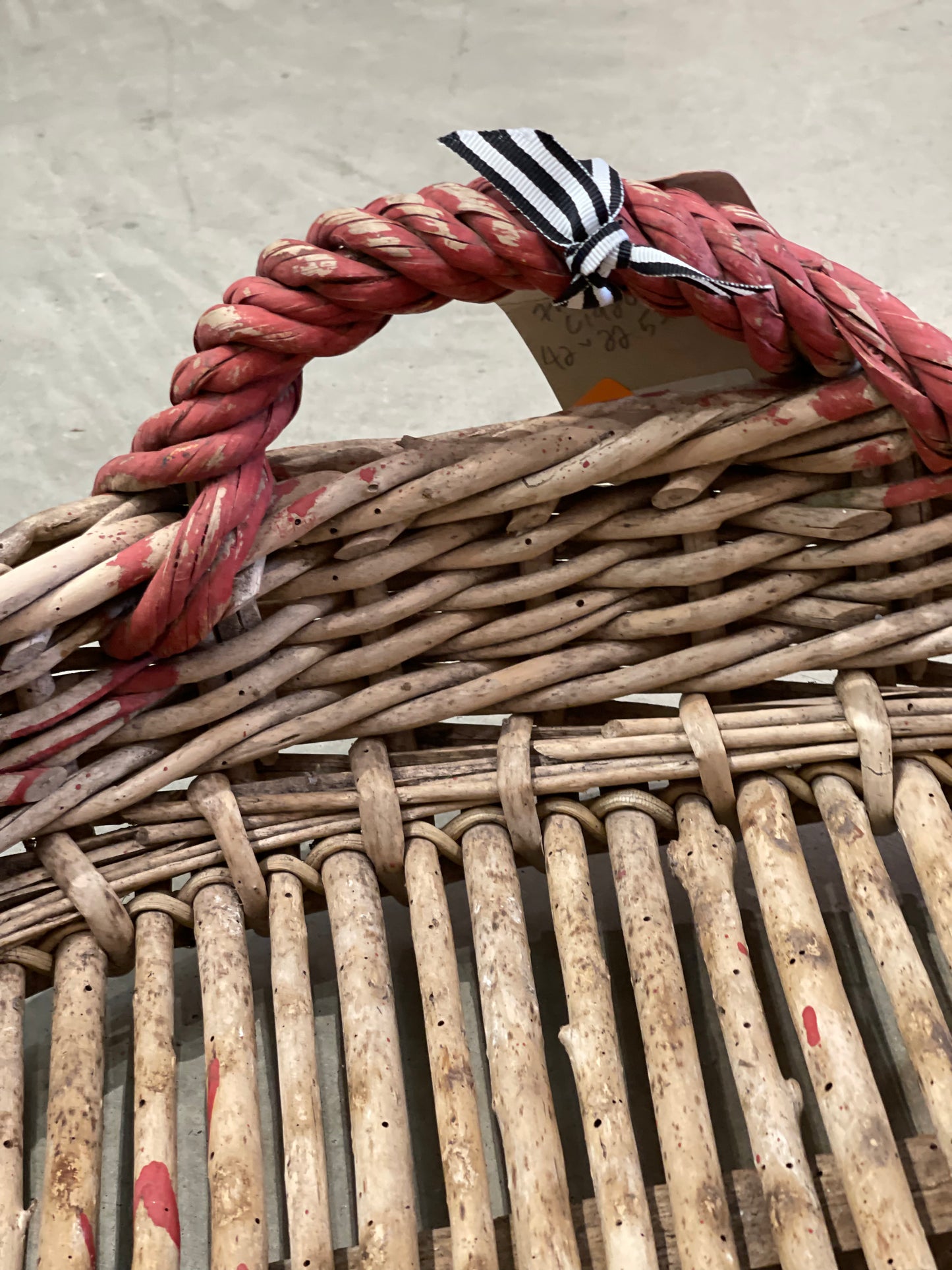 Grape Sorting Basket with Red Writing and Red Handles