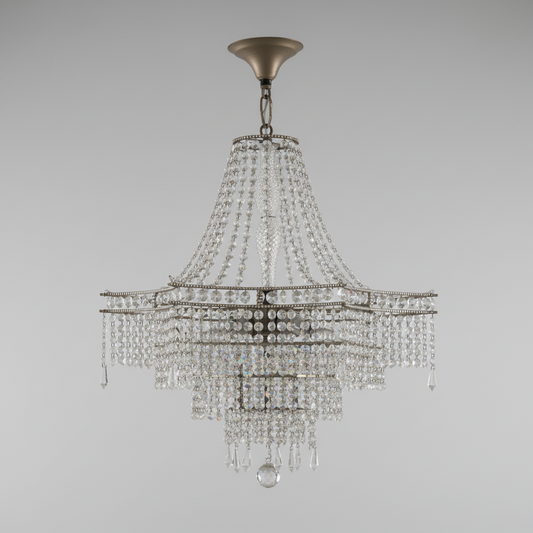 Crystal chandelier hanging in a room with brick walls