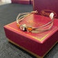 UT Longhorns with two orange jewels Ronaldo bracelet